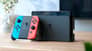 شتر nintendo-switch-oled-handheld-console-64gb-neon-blue-and-red